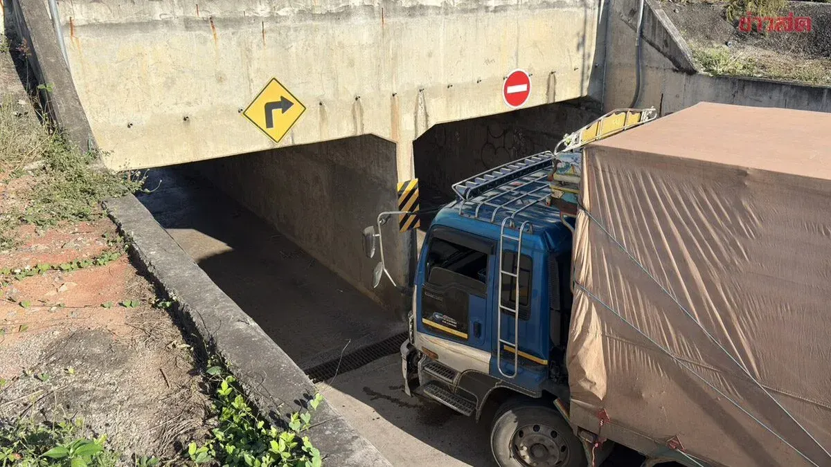 GPS Error Traps Rice Truck in Railway Underpass in Korat