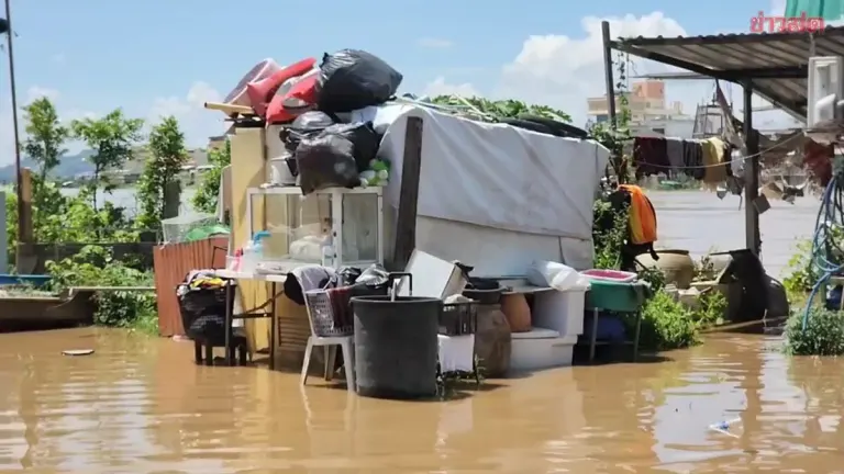 Upstream Floodwaters Swamp Riverside Communities in Nakhon Sawan